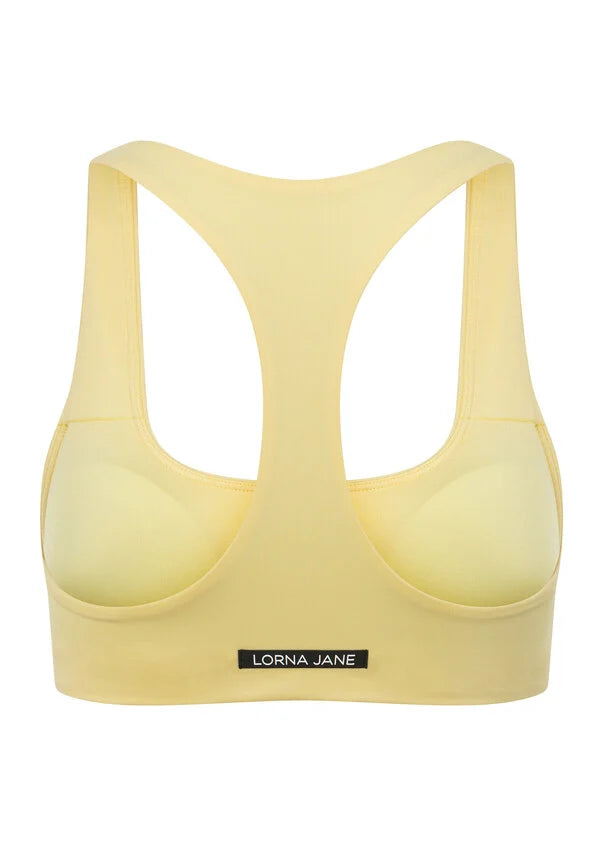 Workout in style in this all-day support sports bra, made from our sweat wicking Nothing 2 See Here™ fabric. Featuring a flattering curved underbust shape and removable padding for added support, this streamlined bra is perfect for all day comfort and low intensity workouts.