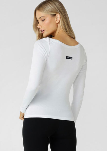 Wear Anywhere Classic Design
Flattering Slim Fit Full Length Silhouette
Wear it your Way Reversible Design- Woven Logo Badge at Front or Back
Fun and Femme Lace Lined Boat Neckline
Soft Cotton Blend Rib You'll Want To Wear All Day, Everyday