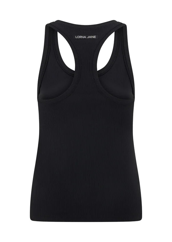 Reach new heights in this active tank designed for high intensity workouts, weekend walks, and everything in between. Designed to become your new active layering essential, the form fitting silhouette stays in place while the active rib fabrication wicks away sweat, so you can focus on your workout