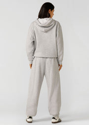 Spoil yourself with comfort in the Sports Club Fleece Hoodie. Made from our cosy brushed fleece fabric, this oversized pullover features a kangaroo pocket, a hood with drawcord adjustability and our limited edition embroidered logo. This will be your go-to leisure piece when the weather starts to cool down!