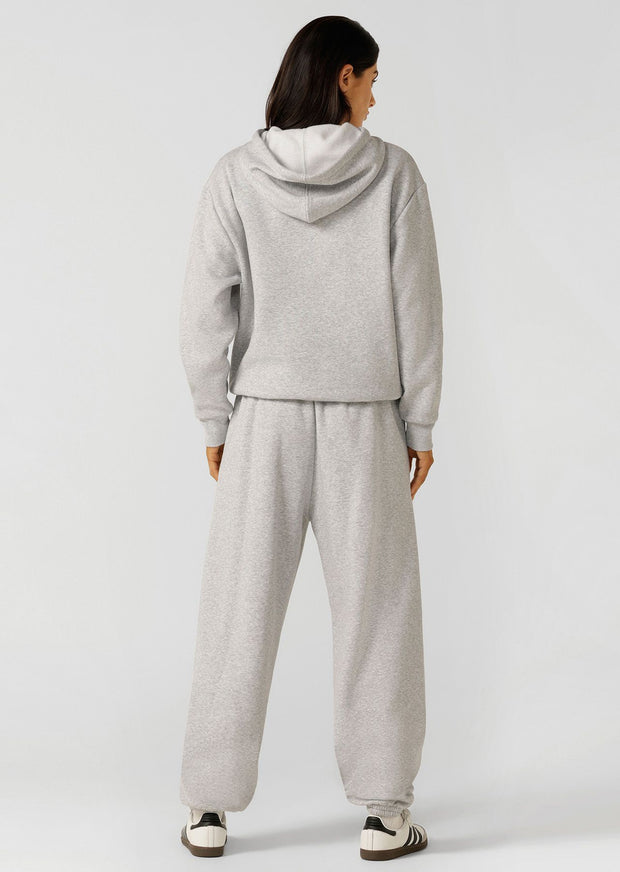 Spoil yourself with comfort in the Sports Club Fleece Hoodie. Made from our cosy brushed fleece fabric, this oversized pullover features a kangaroo pocket, a hood with drawcord adjustability and our limited edition embroidered logo. This will be your go-to leisure piece when the weather starts to cool down!