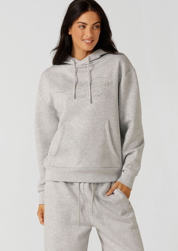 Spoil yourself with comfort in the Sports Club Fleece Hoodie. Made from our cosy brushed fleece fabric, this oversized pullover features a kangaroo pocket, a hood with drawcord adjustability and our limited edition embroidered logo. This will be your go-to leisure piece when the weather starts to cool down!