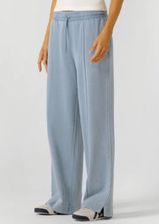 Level up your athleisure look in these vintage-inspired washed sweat pants. Made from our transseasonal cotton blend terry fabric, with elongating pin-tuck panelling down the leg, this style is designed to keep you warm without compromising on style. Complete with an elastic waistband with drawcord adjustability, hand pockets to stash your essentials and a one-of-a-kind garment wash, which is unique to every piece and gives just the right amount of vintage appeal. Style back with the Movement Washed Zip Thr