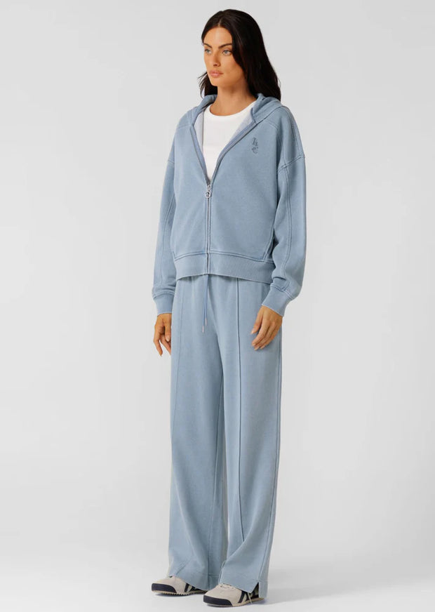 Level up your athleisure look with this vintage-inspired washed zip through hoodie. Made from our transseasonal cotton blend terry fabric, with a cosy hood, this style is designed to keep you warm without compromising on style. Complete with hand pockets to stash your essentials and a one-of-a-kind garment wash, which is unique to every piece and gives just the right amount of vintage appeal. Style back with the Movement Washed Pants for the ultimate retro athleisure look.