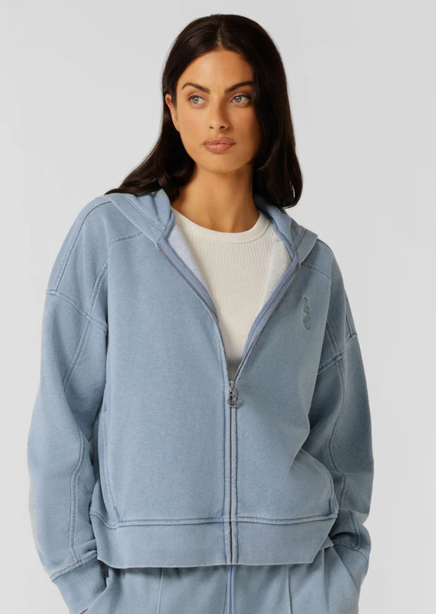 Level up your athleisure look with this vintage-inspired washed zip through hoodie. Made from our transseasonal cotton blend terry fabric, with a cosy hood, this style is designed to keep you warm without compromising on style. Complete with hand pockets to stash your essentials and a one-of-a-kind garment wash, which is unique to every piece and gives just the right amount of vintage appeal. Style back with the Movement Washed Pants for the ultimate retro athleisure look.