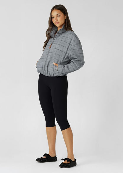 Neat Fit Bomber Inspired Silhouette with High Athletic Neckline and Zip Front Closure
Soft Touch Cotton Blend Fabrication in a classic Grey Mini Check Design
Side Pockets to Stash your Essentials
Adjustable Sleeve Cuffs with Press Stud Closure to Trap in Warmth
Premium Faux Leather Logo Patch and Iconic Zip Puller