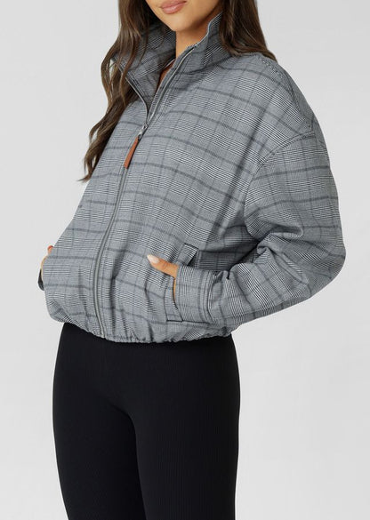 Neat Fit Bomber Inspired Silhouette with High Athletic Neckline and Zip Front Closure
Soft Touch Cotton Blend Fabrication in a classic Grey Mini Check Design
Side Pockets to Stash your Essentials
Adjustable Sleeve Cuffs with Press Stud Closure to Trap in Warmth
Premium Faux Leather Logo Patch and Iconic Zip Puller
