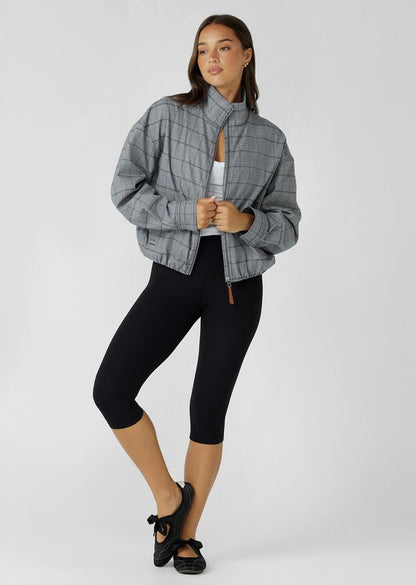 Neat Fit Bomber Inspired Silhouette with High Athletic Neckline and Zip Front Closure
Soft Touch Cotton Blend Fabrication in a classic Grey Mini Check Design
Side Pockets to Stash your Essentials
Adjustable Sleeve Cuffs with Press Stud Closure to Trap in Warmth
Premium Faux Leather Logo Patch and Iconic Zip Puller