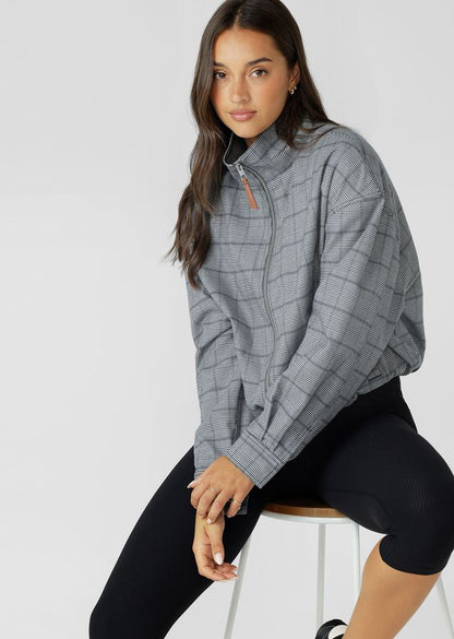 Neat Fit Bomber Inspired Silhouette with High Athletic Neckline and Zip Front Closure
Soft Touch Cotton Blend Fabrication in a classic Grey Mini Check Design
Side Pockets to Stash your Essentials
Adjustable Sleeve Cuffs with Press Stud Closure to Trap in Warmth
Premium Faux Leather Logo Patch and Iconic Zip Puller