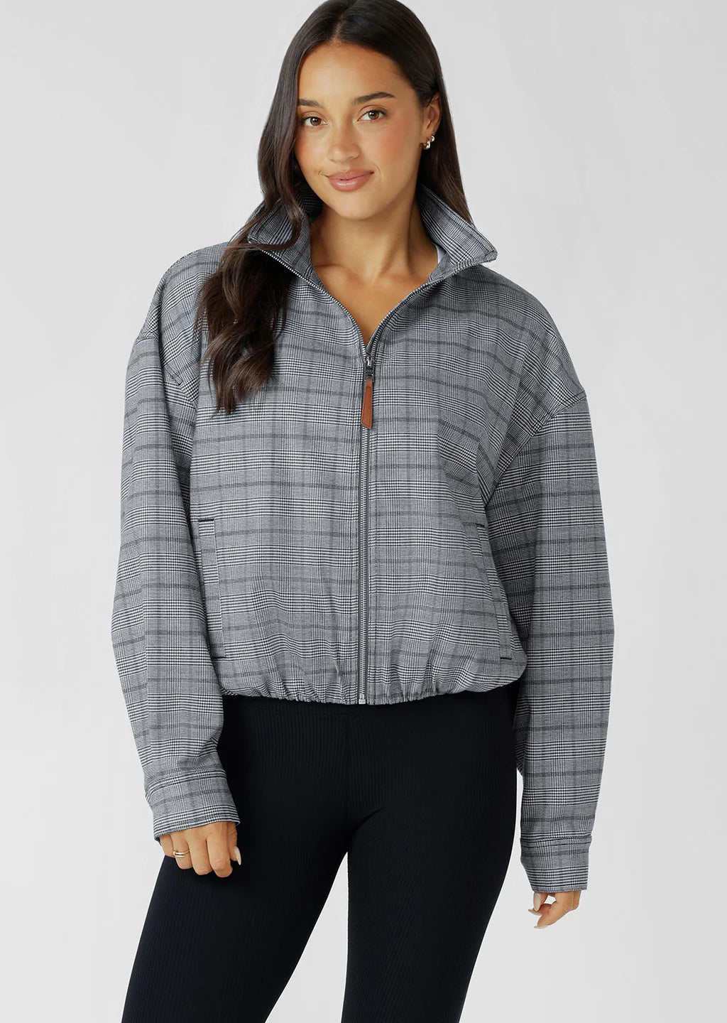Neat Fit Bomber Inspired Silhouette with High Athletic Neckline and Zip Front Closure
Soft Touch Cotton Blend Fabrication in a classic Grey Mini Check Design
Side Pockets to Stash your Essentials
Adjustable Sleeve Cuffs with Press Stud Closure to Trap in Warmth
Premium Faux Leather Logo Patch and Iconic Zip Puller