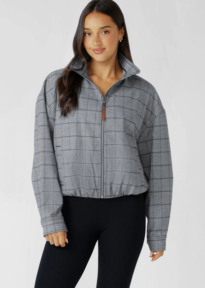 Neat Fit Bomber Inspired Silhouette with High Athletic Neckline and Zip Front Closure
Soft Touch Cotton Blend Fabrication in a classic Grey Mini Check Design
Side Pockets to Stash your Essentials
Adjustable Sleeve Cuffs with Press Stud Closure to Trap in Warmth
Premium Faux Leather Logo Patch and Iconic Zip Puller
