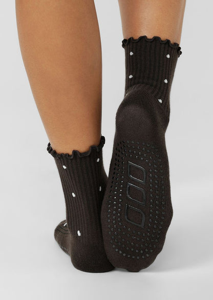 Iconic Non-Slip Design
Strategically Placed Cushioning for Added Comfort
Feminine Frill Edge and Polka Dot Design
Versatile Crew length