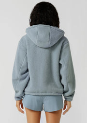 Make a statement in this stylish teddy zip through hoodie, the must-have addition to your athleisure wardrobe. Designed to keep you cosy, this hoodie features drawcord adjustability to trap in the warmth, a no-fuss zip-through opening, oversized silhouette and a multi pocket design, perfect for when the weather starts to cool down.
