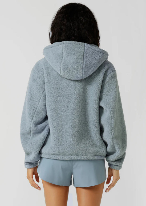 Make a statement in this stylish teddy zip through hoodie, the must-have addition to your athleisure wardrobe. Designed to keep you cosy, this hoodie features drawcord adjustability to trap in the warmth, a no-fuss zip-through opening, oversized silhouette and a multi pocket design, perfect for when the weather starts to cool down.