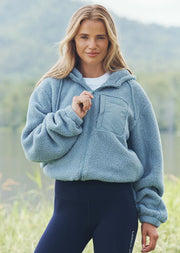 Make a statement in this stylish teddy zip through hoodie, the must-have addition to your athleisure wardrobe. Designed to keep you cosy, this hoodie features drawcord adjustability to trap in the warmth, a no-fuss zip-through opening, oversized silhouette and a multi pocket design, perfect for when the weather starts to cool down.