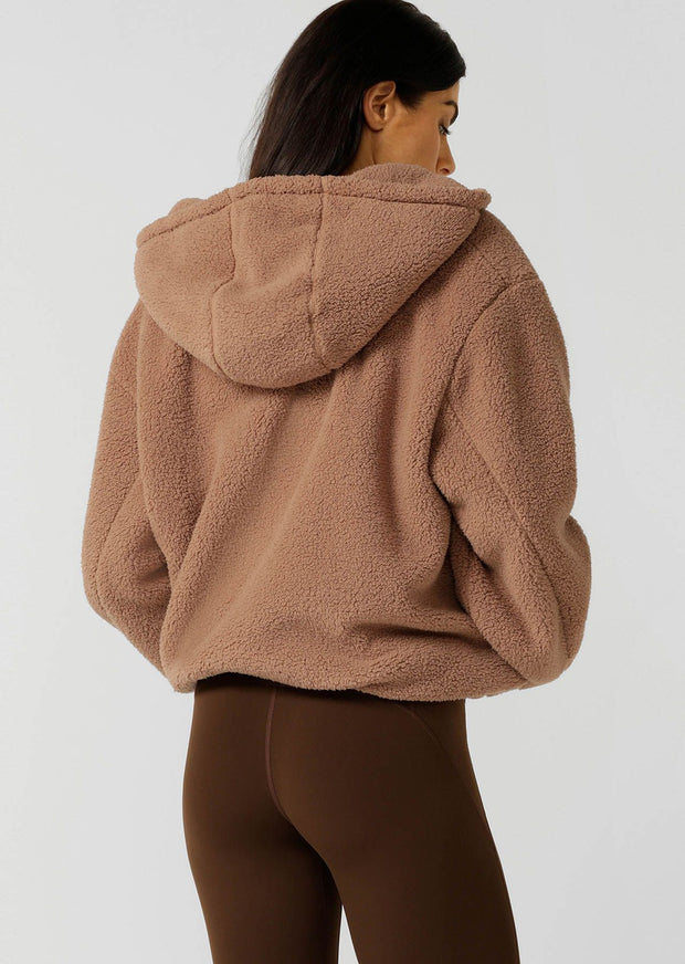 Make a statement in this stylish teddy zip through hoodie, the must-have addition to your athleisure wardrobe. Designed to keep you cosy, this hoodie features drawcord adjustability to trap in the warmth, a no-fuss zip-through opening, oversized silhouette and a multi pocket design, perfect for when the weather starts to cool down.