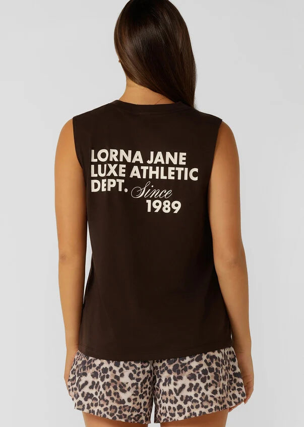 Elevate your activewear game in this effortlessly cool muscle tank. Crafted from a soft cotton blend jersey, with a limited edition front and back logo print, this relaxed fit tank will be your go-to top in and-out of the gym.