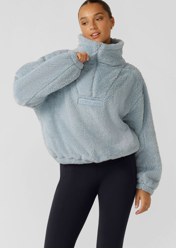 The Ultra Soft Teddy Pullover is your ultimate Winter companion. Providing maximum warmth without weighing you down, this oversized pullover is made from plush teddy fabric and features pockets to keep your hands warm with half-zip collar for ease of getting on and off.