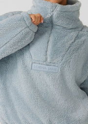 The Ultra Soft Teddy Pullover is your ultimate Winter companion. Providing maximum warmth without weighing you down, this oversized pullover is made from plush teddy fabric and features pockets to keep your hands warm with half-zip collar for ease of getting on and off.