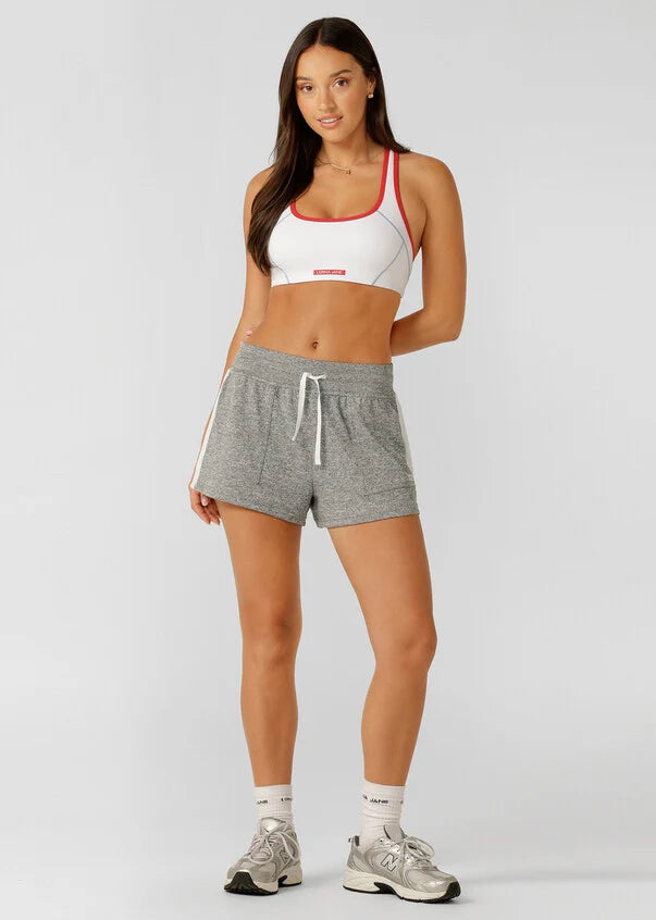 Must-Have Heritage Piece
Contrast Taping for a retro-sport look
Side Pockets to Stash your Essentials
Elasticated Waistband with drawcord adjustability
Form Flattering Mid Rise cheeky silhouette