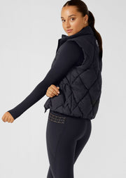 Keep out the chill with the Winter Warmth Puffer Vest. This warm winter staple has  plant-based Sorona® filling (which is warmer than standard polyester fill). It features an easy zip through opening and hidden toggles to cinch your hem and trap in the warmth. This is the perfect zip-and-go addition to your active and leisure outfits! 