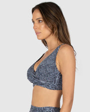 Introducing the Marilyn F Cup Bralette, thoughtfully designed for comfort and support. With removable cups, a soft underbust band providing support, and incorporated boning for stability, it ensures a secure and flattering fit. Featuring power mesh for added stability and convertible, adjustable straps, this bralette offers versatility and customized comfort for all-day wear.