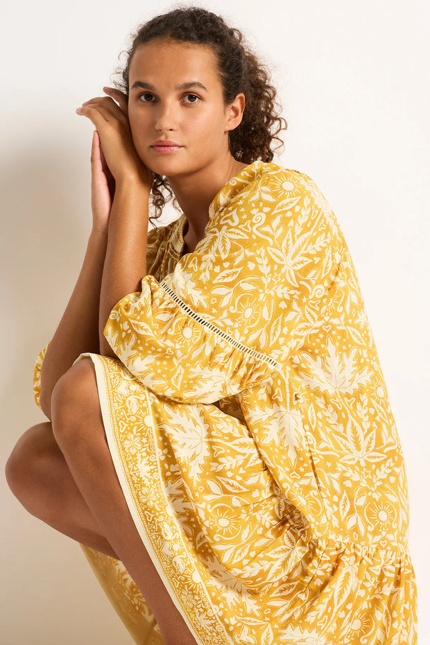 The Desert Gold Mini Dress is your new summer staple. Consciously created from environmentally responsible and sustainably sourced Lenzing Viscose for a soft flowing silhouette with border print neck and hem and pretty fagoting trim inserts within sleeve seams.