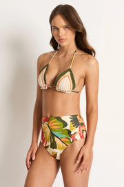 The Fernanda Reversible High Waist Bikini Pant sits at the waist and has a flattering lower leg height with good bottom coverage and is fully reversible to wear either as the exclusive hand painted Brazilian rainforest design or as a linen-look graduated stripe.