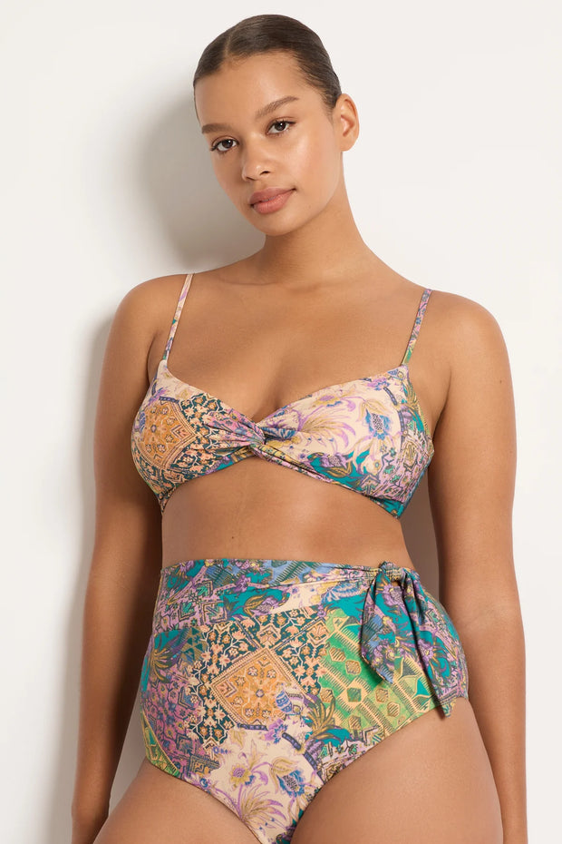 The Willow Twist Front Bralette Bikini Top is our petite version of our best selling multi fit twist for girls that want a bralette shape with narrower straps. Styled for a variety of cup sizes from a B cup to an D. It features a flattering twist at the centre front with over the shoulder adjustable straps and an E hook back with 3 loop positions for the perfect fit.