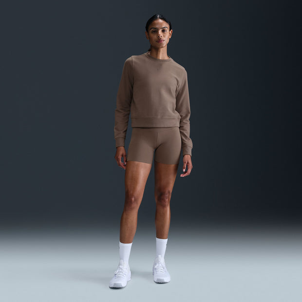 Stay comfortable no matter what day it is in this relaxed, sweat-wicking Nike One sweatshirt. Its midweight French terry fabric (with unbrushed loops on the inside) gives structure, breathability and softness—so it's just as ready for the gym as it is for the couch.

Nike Dri-FIT technology moves sweat away from your skin for quicker evaporation, helping you stay dry and comfortable.
Ribbed cuffs and hem help keep sweatshirt in place while you move.