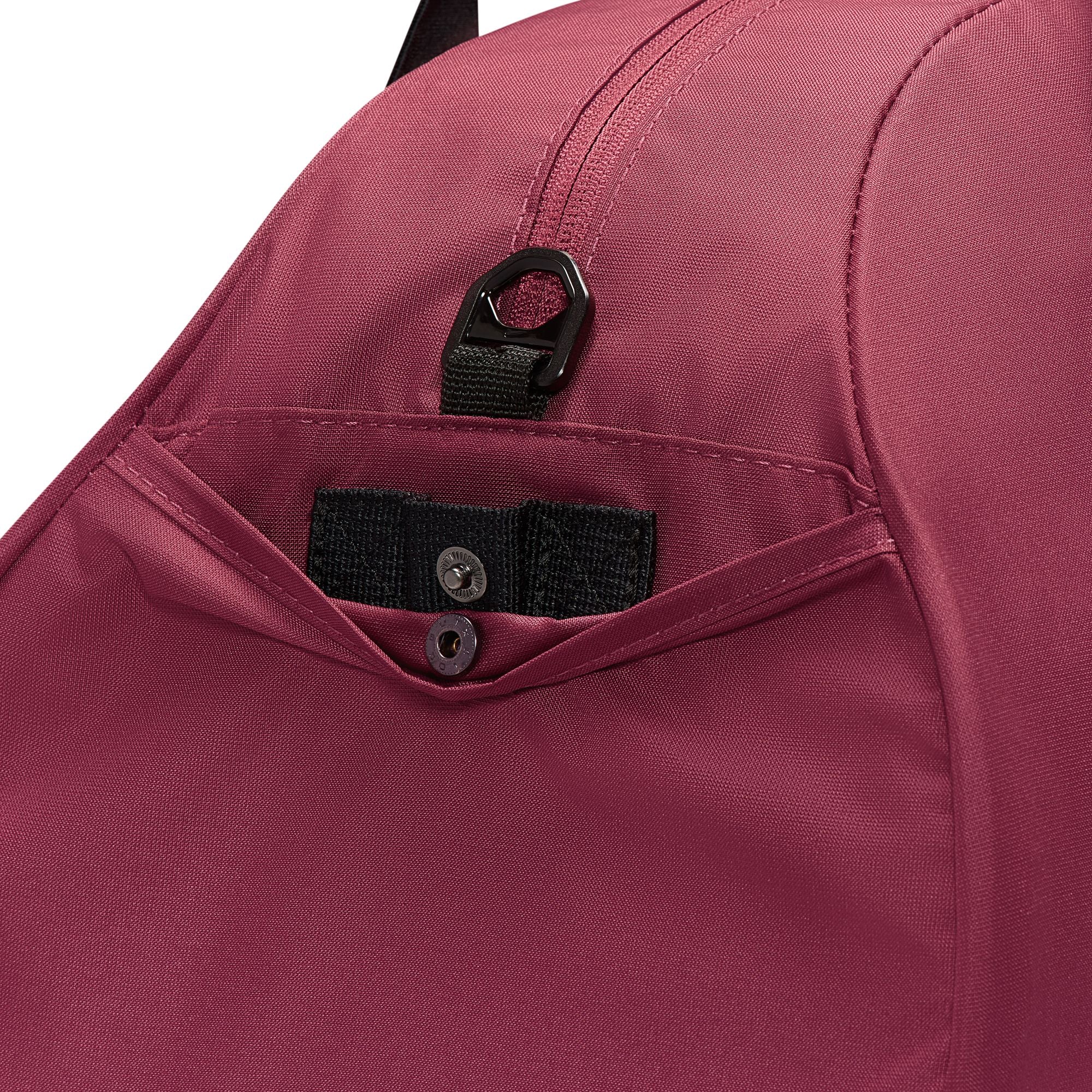 Main compartment with dual zippers provides space to store larger items.
Adjustable shoulder strap and dual handles give you comfortable carrying options.
Interior pockets provide small-item storage.