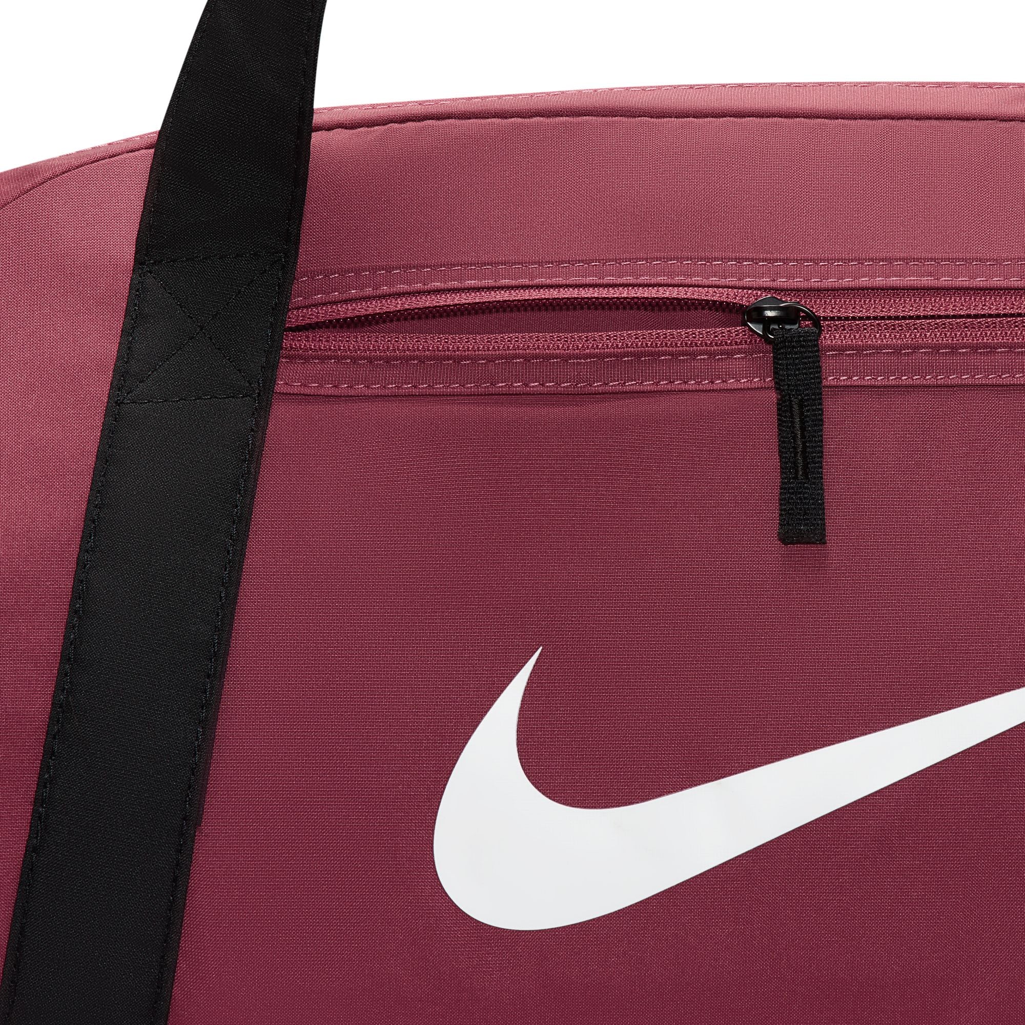 Main compartment with dual zippers provides space to store larger items.
Adjustable shoulder strap and dual handles give you comfortable carrying options.
Interior pockets provide small-item storage.
