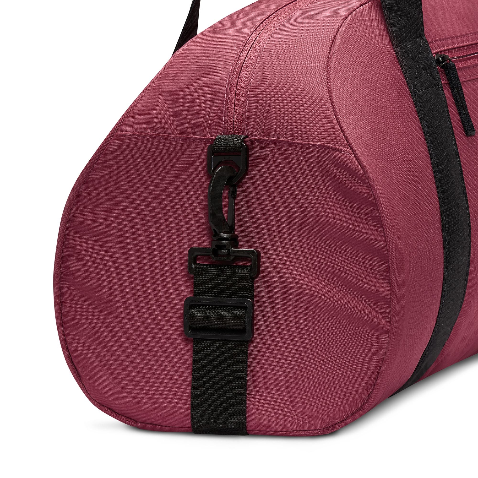 Main compartment with dual zippers provides space to store larger items.
Adjustable shoulder strap and dual handles give you comfortable carrying options.
Interior pockets provide small-item storage.