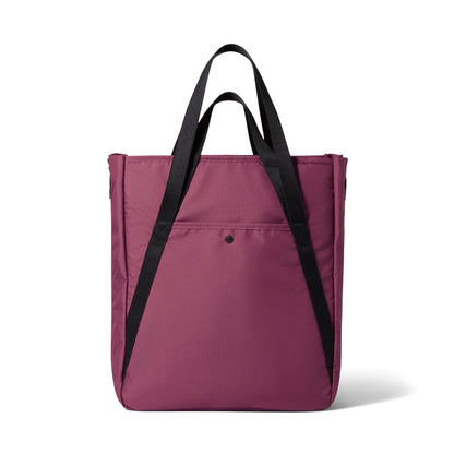 A structured tote bag in a dusty plum purple color with black shoulder straps, shown against a plain white background.