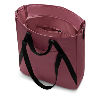 Pink tote bag with black handles on a white background
