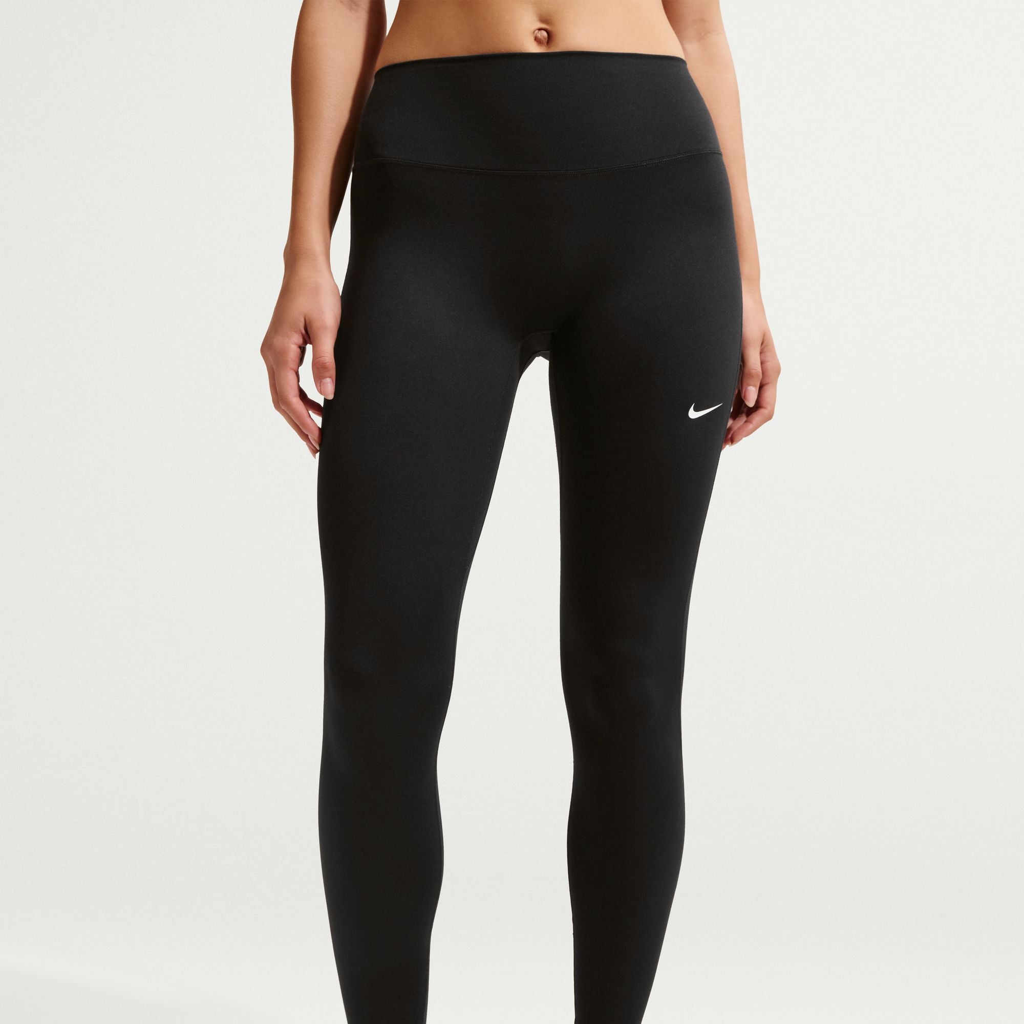 Nike One works for it all. Midweight and peachy-soft, these leggings stretch with your every move and dry quickly for comfort in any activity. The absence of a front seam helps keep the fabric from riding up for a smooth fit.
