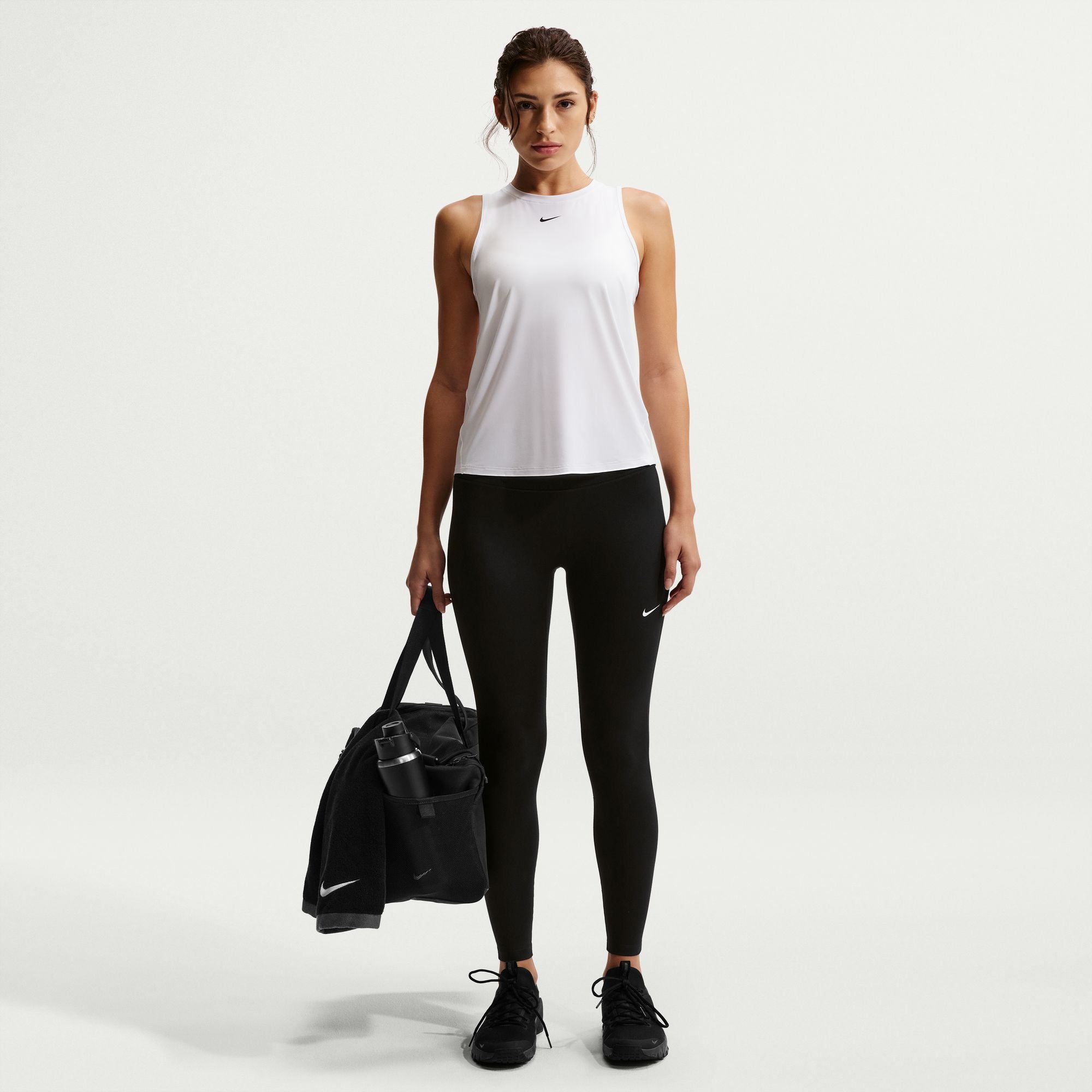Nike One works for it all. Midweight and peachy-soft, these leggings stretch with your every move and dry quickly for comfort in any activity. The absence of a front seam helps keep the fabric from riding up for a smooth fit.
