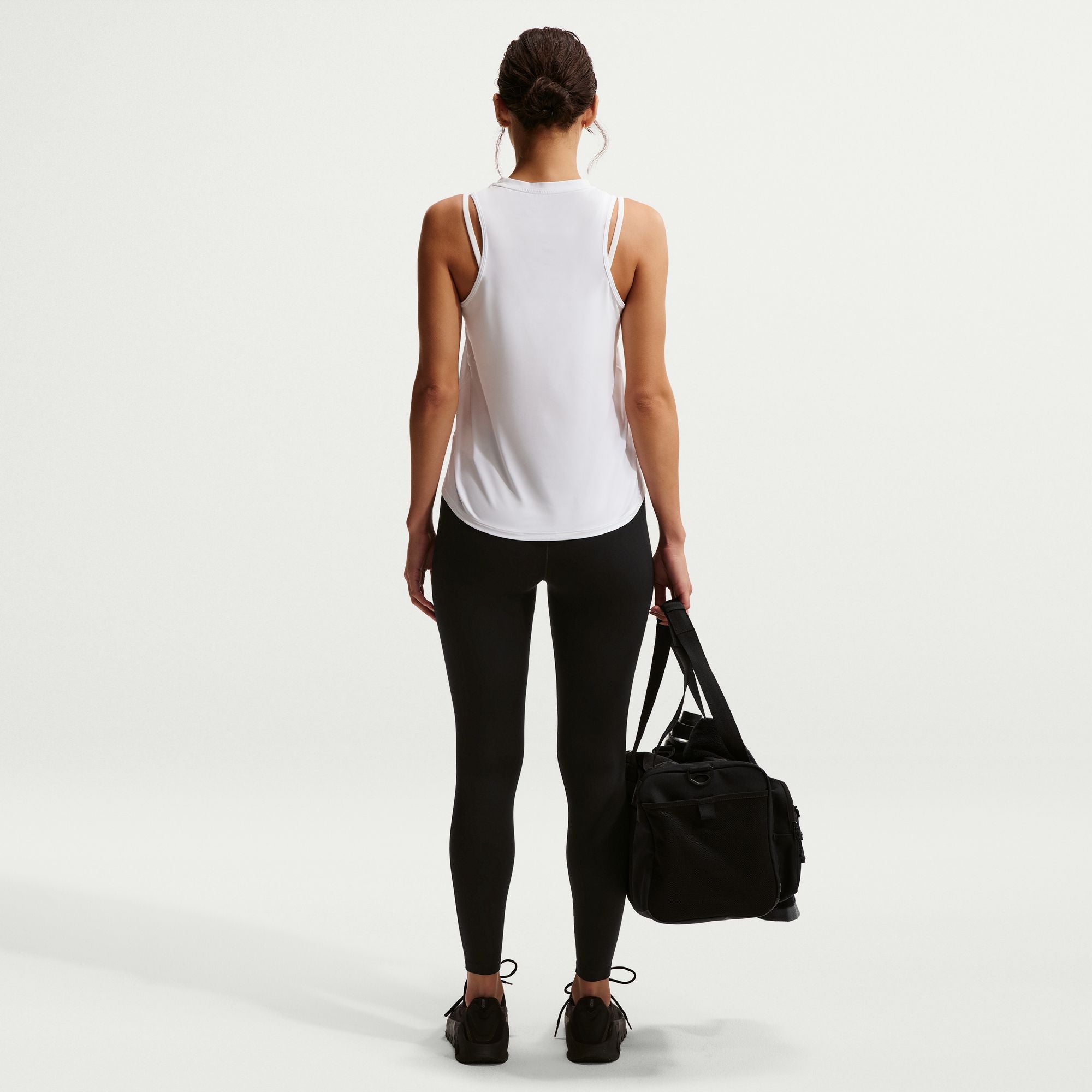 Nike One works for it all. Midweight and peachy-soft, these leggings stretch with your every move and dry quickly for comfort in any activity. The absence of a front seam helps keep the fabric from riding up for a smooth fit.
