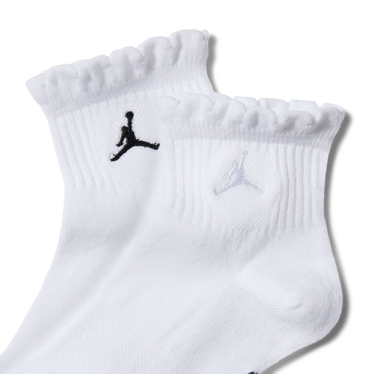 Complement your fit with these ankle socks, made of a core poly blend with lettuce trimmed cuffs. A ribbed arch support band gives you that extra-supportive feel.