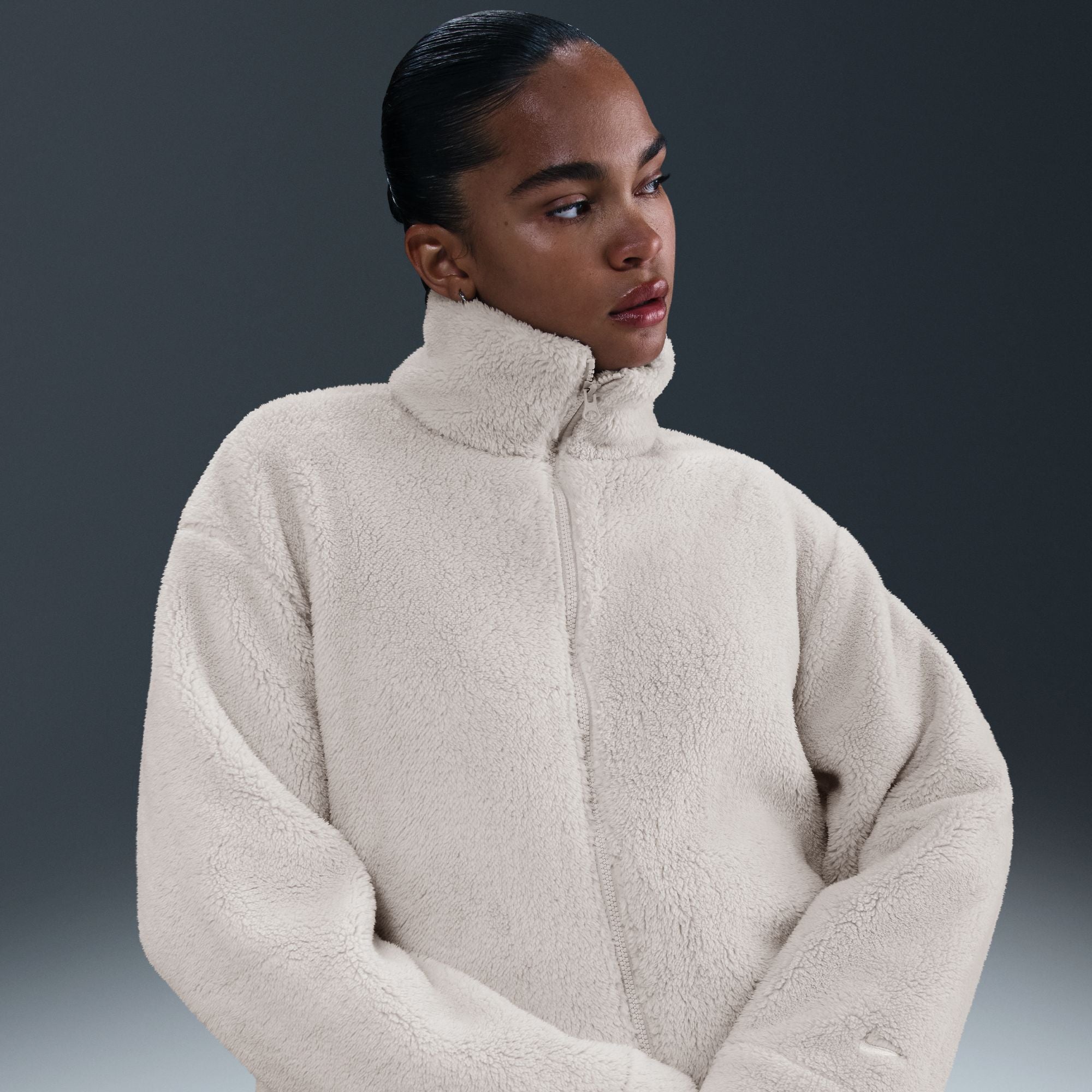 Get cozy in this oversized jacket. Supersoft fleece feels like you're wearing a blanket all day long and helps keep you warm.