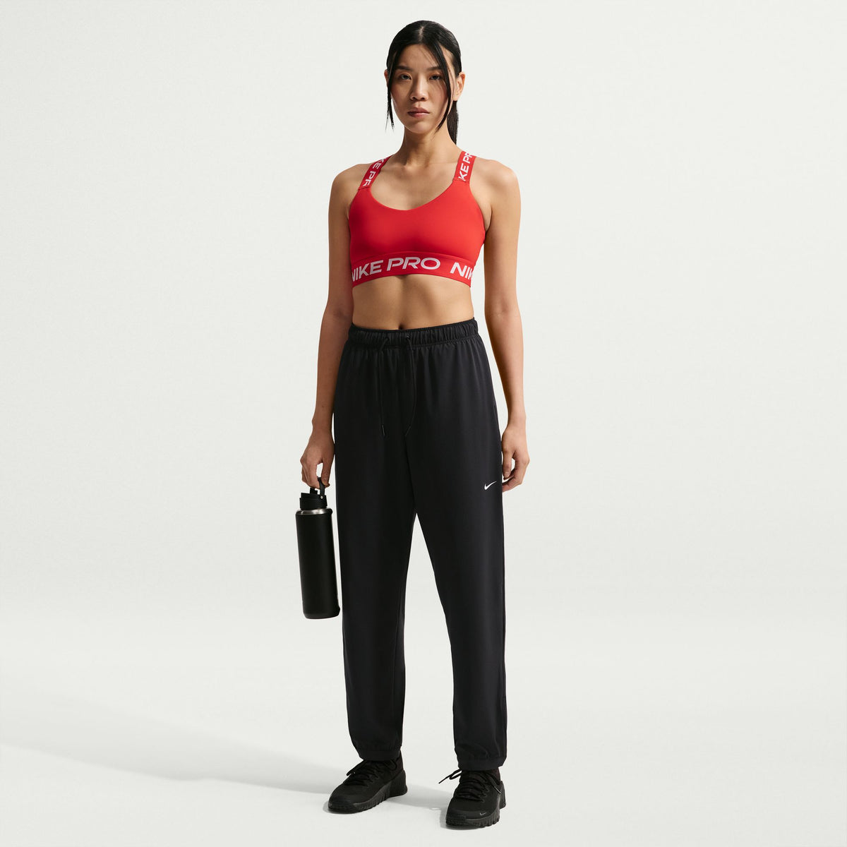 Nike Dri-FIT technology moves sweat away from your skin for quicker evaporation, helping you stay dry and comfortable.
Encased elastic waistband with drawcord secures your fit.
Hidden snaps at the pant cuffs offer an easy on and off experience.