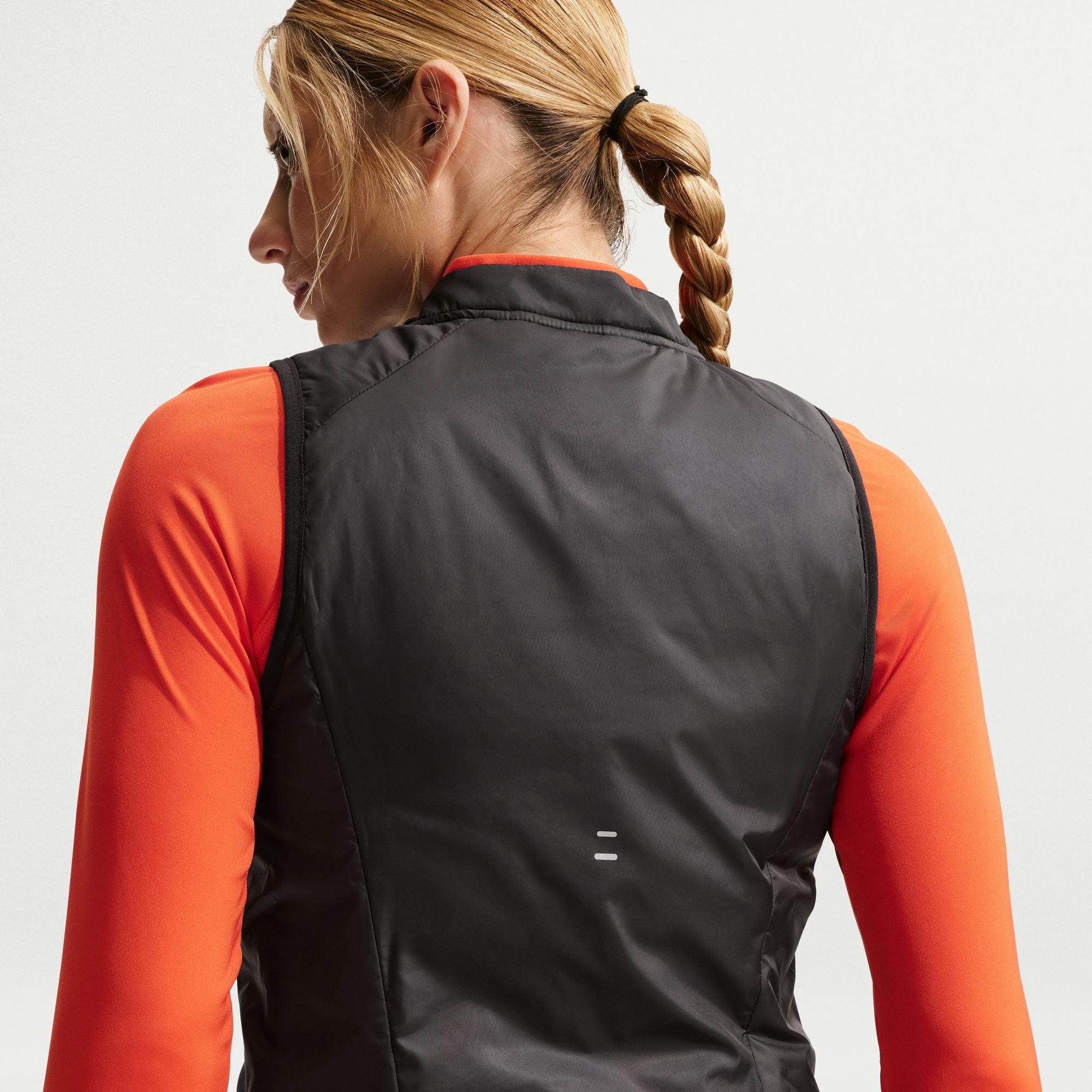 Women's Repel Warm Running Vest
Tempo is bringing the heat in this sleek vest. Made with a lightweight fill and water-repellent finish, it helps keep your core warm and guarded without weighing you down. Its clean design lines and a minimalist collar give you a close, distraction-free fit so you can pick up the pace.
