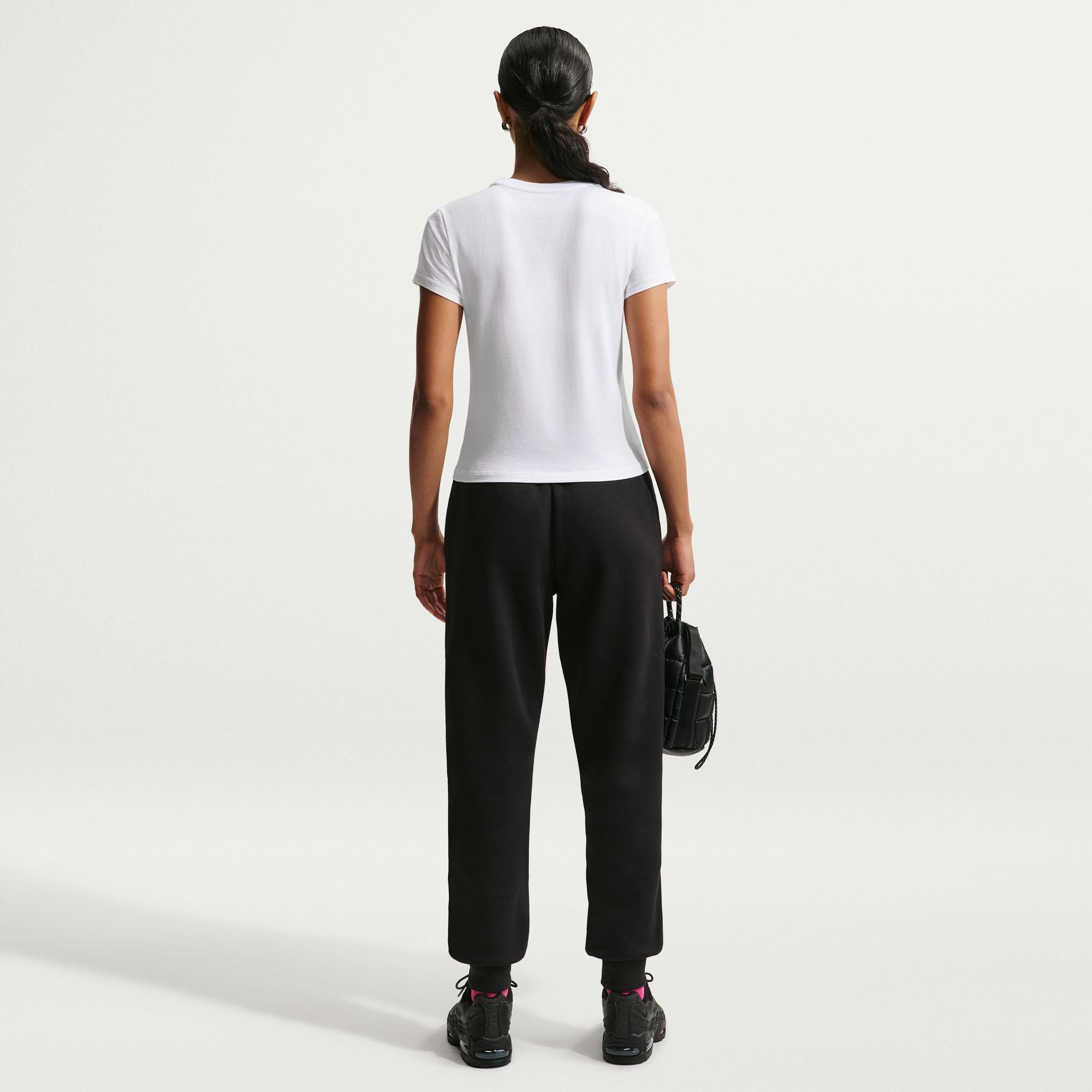 Perfect for any day, this slightly cropped, slim-fitting tee is classic and versatile. Nike's smooth jersey feels stretchy with a slight drape, giving it a comfortable, body-skimming feel.