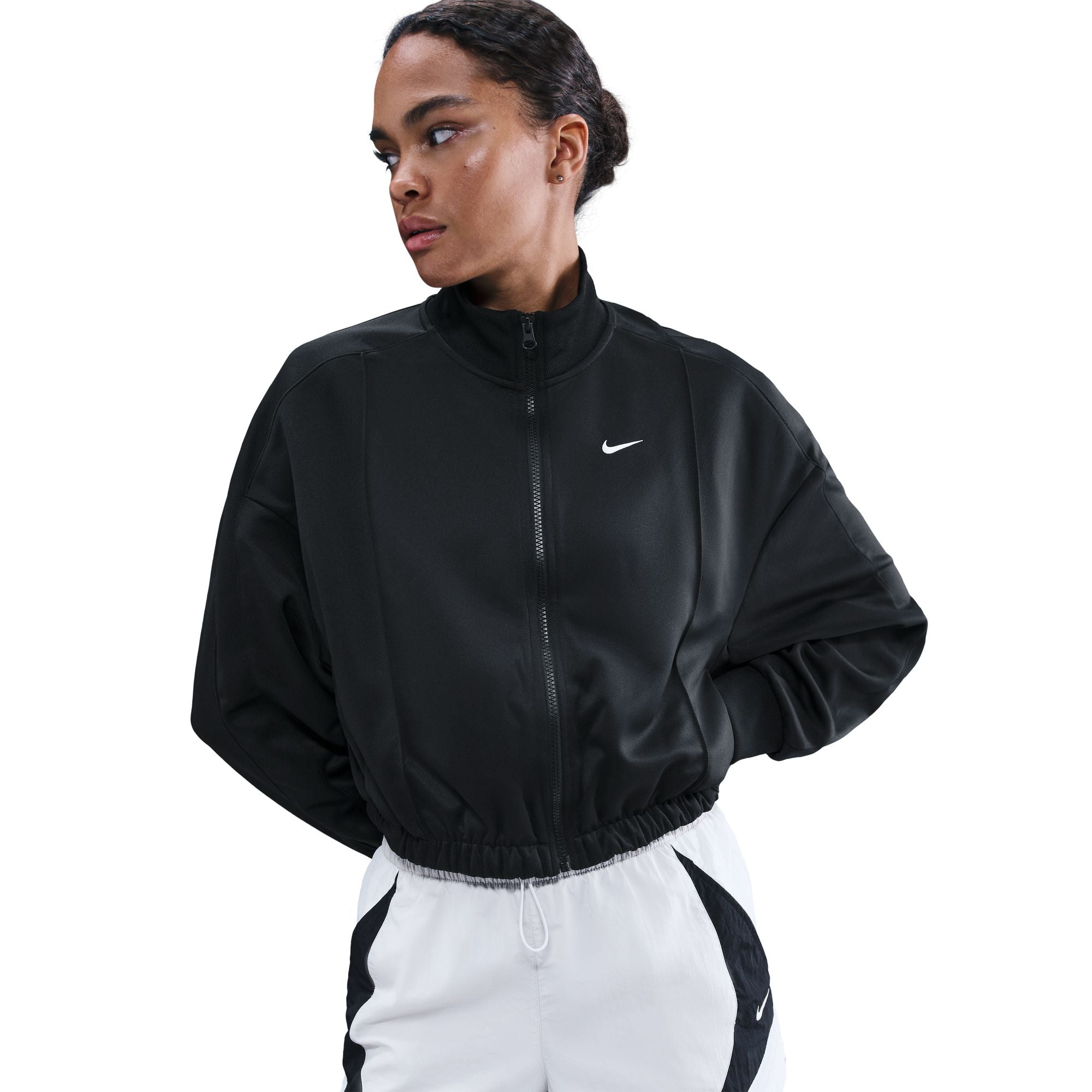 This classic track jacket is elevated through volume and drape. Elastic at your waist cinches in the oversized and slightly cropped silhouette.