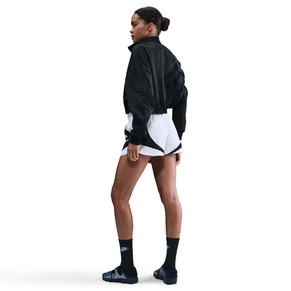This classic track jacket is elevated through volume and drape. Elastic at your waist cinches in the oversized and slightly cropped silhouette.