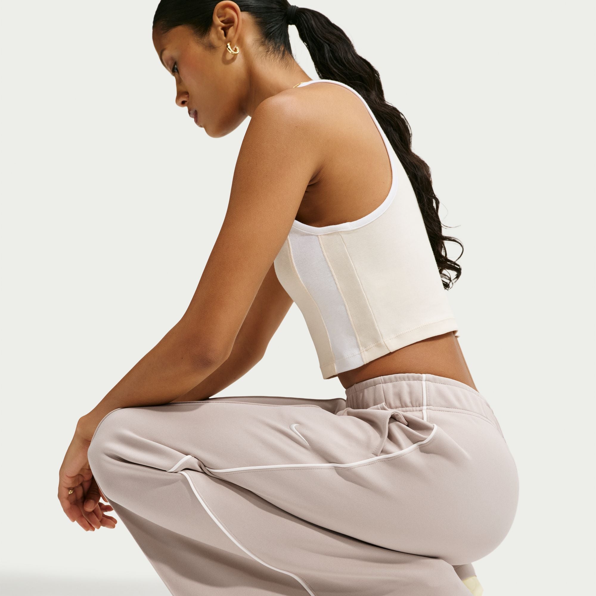 Mid-Rise Wide-Leg Track Pants
Nike are reimagining classic track pants. Midweight knit and super wide legs combine to bring effortless drape to your look.