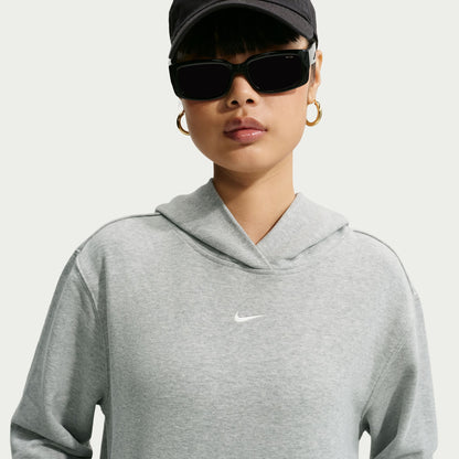 Person wearing a grey Nike hoodie 