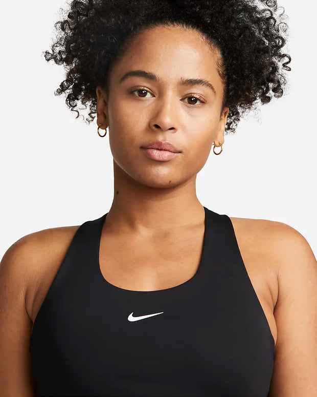 When you want it all, this tank is the pick. The iconic Swoosh bra is built in and smooth, stretchy fabric snuggly holds you, so you're set with everything you need to go from the office to the gym and back again. 