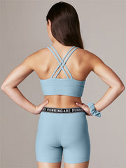 With comfort the design priority, the Girls Lotus sports bra is perfect for all-day wear for sport or leisure. Constructed from structured performance Supplex fabric with four way stretch for comfort and all-day wear and offered in our gorgeously sky breeze colourway. Team with her favourite leggings or sport tights for a range of workouts such as yoga, martial arts, dance and trampoline