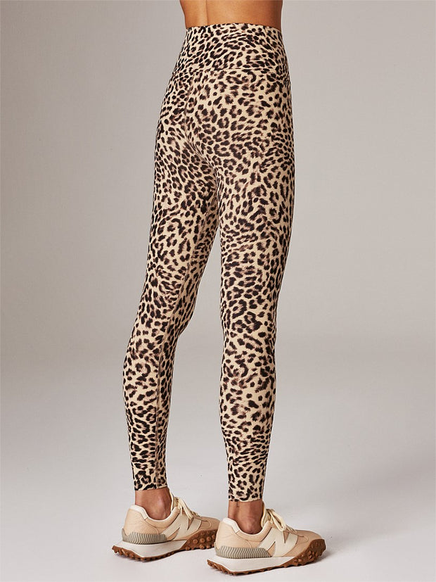 Feel like a goddess in the ultra-flattering crossover waist Muse Ab-Tastic leggings. Constructed from RB's buttery soft Supplex Luxe fabric with four way stretch for comfort and all-day wear and features the purrrfect statement animal print. Activewear leggings designed for the studio and yoga workouts but will out perform in any impact workouts.  Features:  28 inch in-seam Ab tastic = RB's highest waist EVER Seamless outer leg Flatlock seams do not chafe, rub or irritate Gusset Made in Australia